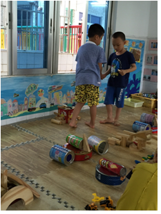 幼儿园中班建构区观察记录：宝贝，你懂得分享和合作了！